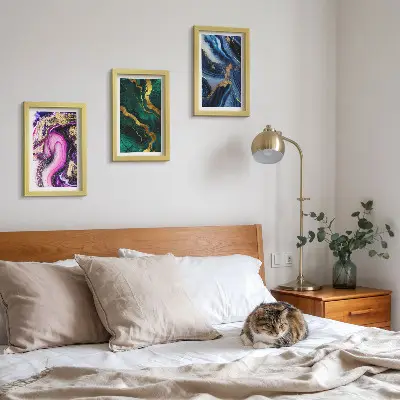 Photo frame wall with abstract patterns in shades of pink, green, and blue