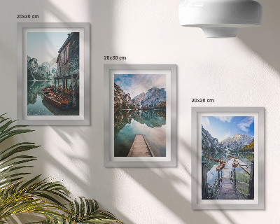 Framed triptych A quiet lake in the mountains with wooden boats