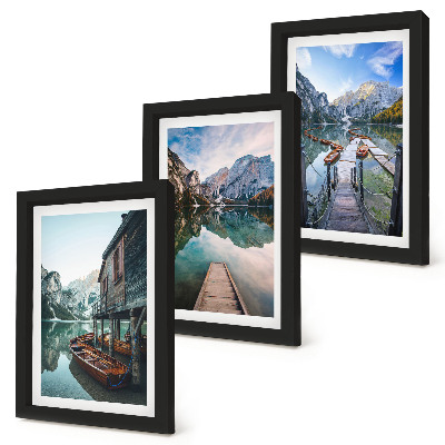 Framed triptych A quiet lake in the mountains with wooden boats