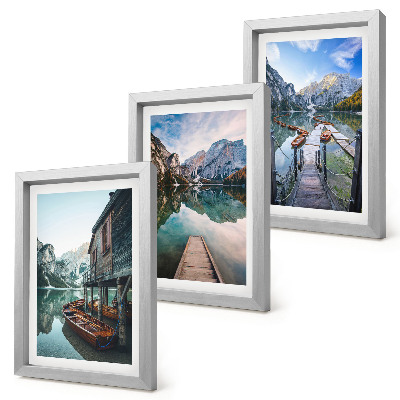 Framed triptych A quiet lake in the mountains with wooden boats