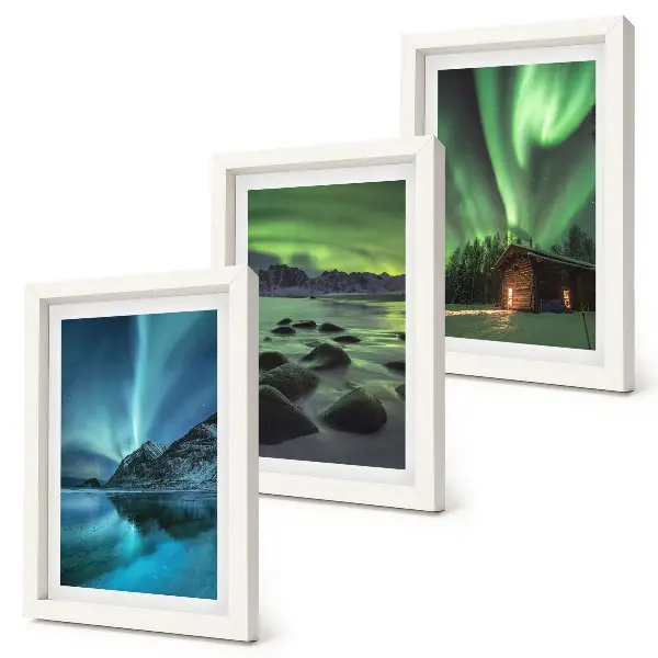 Winter landscapes with the Northern Lights over the mountains framed triptych