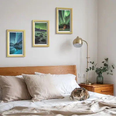Winter landscapes with the Northern Lights over the mountains framed triptych