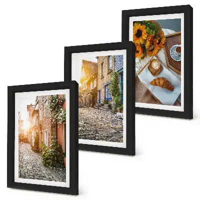 Photo frame wall featuring charming streets with coffee and sunflowers