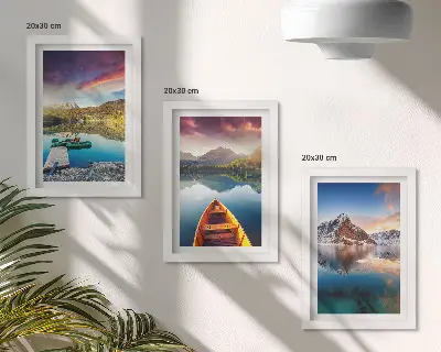 Tranquil lakes with mountain scenery and a boat framed triptych