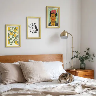 Photo frame wall featuring a Frida Kahlo portrait with a wine-themed lemon slogan