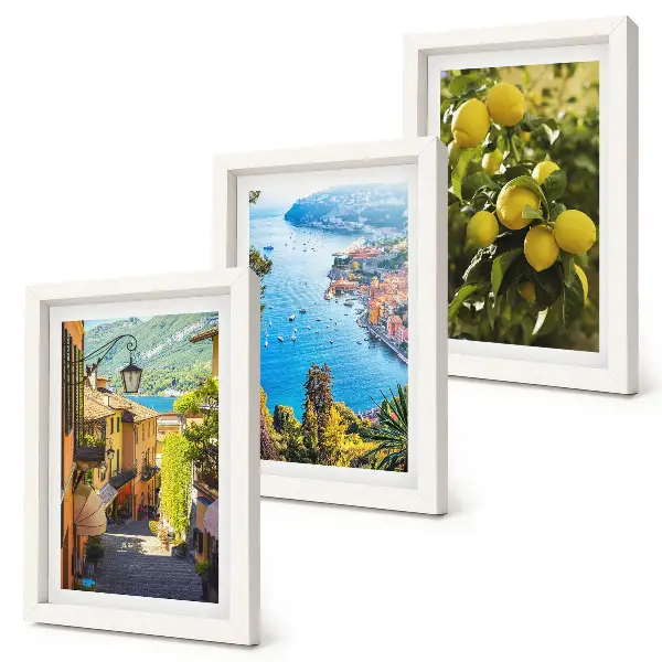 Photo frame wall featuring picturesque seaside streets with a view of the sea and lemons
