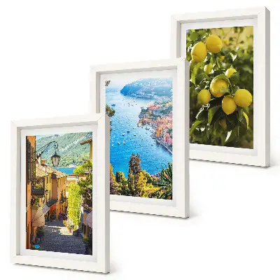 Photo frame wall featuring picturesque seaside streets with a view of the sea and lemons