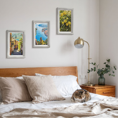 Photo frame wall Picturesque seaside streets with a view of the sea and lemons