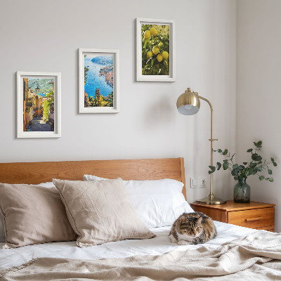 Photo frame wall Picturesque seaside streets with a view of the sea and lemons