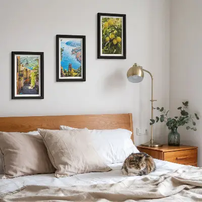 Photo frame wall featuring picturesque seaside streets with a view of the sea and lemons