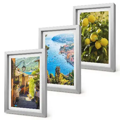 Photo frame wall featuring picturesque seaside streets with a view of the sea and lemons