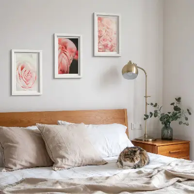Photo frame wall in delicate pastel pink and flamingo shades