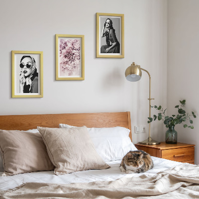 Photo frame wall Stylish portraits of women with pink flowers