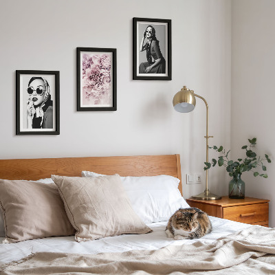 Photo frame wall Stylish portraits of women with pink flowers
