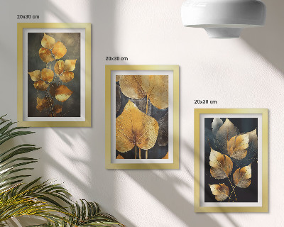 Framed triptych Leaves in shades of yellow on a dark background