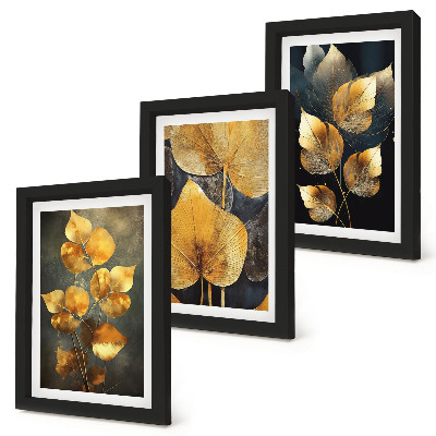 Framed triptych Leaves in shades of yellow on a dark background