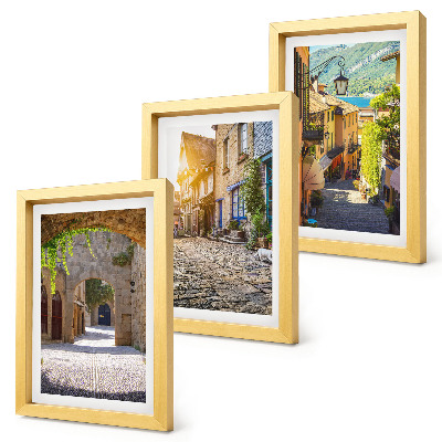 Framed triptych Charming streets with stone buildings and gates