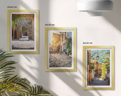 Framed triptych Charming streets with stone buildings and gates