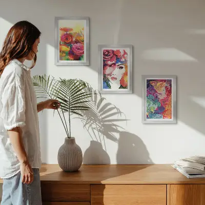 Framed triptych flowers in intense colors with an abstract portrait of a woman