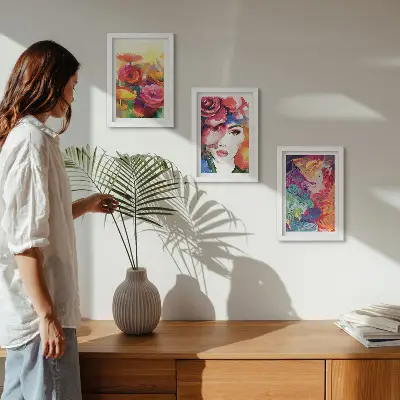 Framed triptych flowers in intense colors with an abstract portrait of a woman