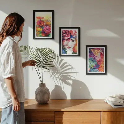 Framed triptych flowers in intense colors with an abstract portrait of a woman