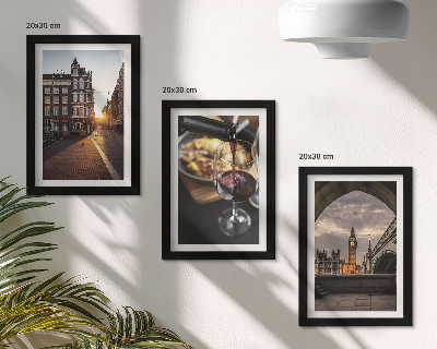 Photo frame wall A set of pictures with a city, food, and a view of London