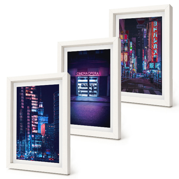 Photo frame wall Night city with neon lights and a cinema entrance