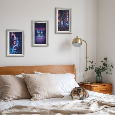 Photo frame wall Night city with neon lights and a cinema entrance