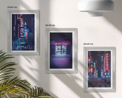 Photo frame wall Night city with neon lights and a cinema entrance