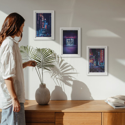 Photo frame wall Night city with neon lights and a cinema entrance