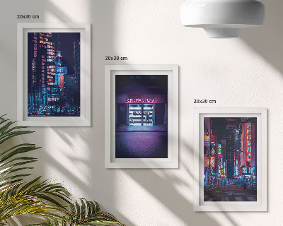 Photo frame wall Night city with neon lights and a cinema entrance