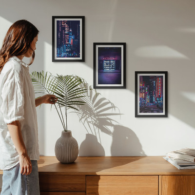 Photo frame wall Night city with neon lights and a cinema entrance