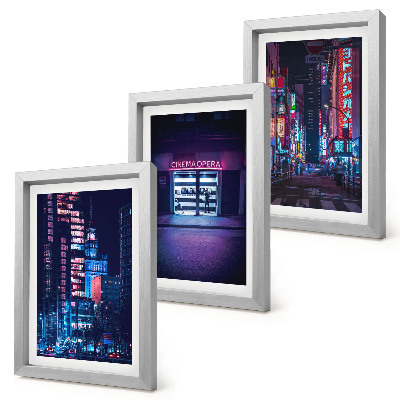Photo frame wall Night city with neon lights and a cinema entrance
