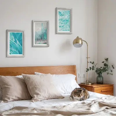 Photo frame wall with delicate abstract patterns in shades of blue