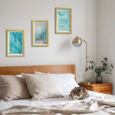 Photo frame wall with delicate abstract patterns in shades of blue