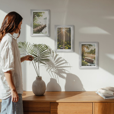 Photo frame wall Peaceful landscapes of the forest and lake with a boat