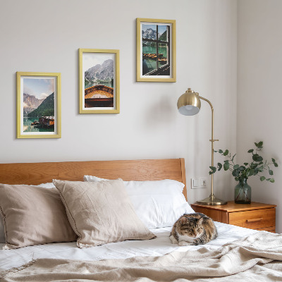 Framed triptych Mountain lake with a boat and wooden houses