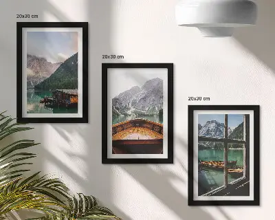 Mountain lake with a boat and wooden houses framed triptych