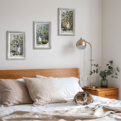 Framed triptych Olives in ceramic dishes on a gray background