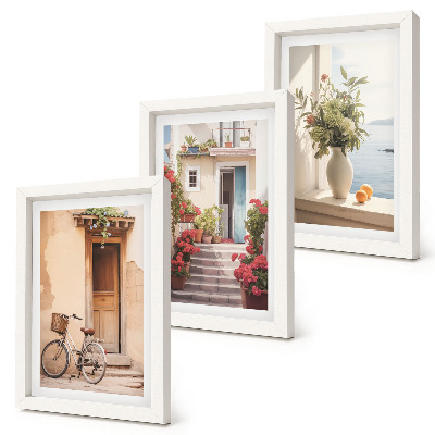 Framed triptych Charming seaside streets with flowers and bicycles