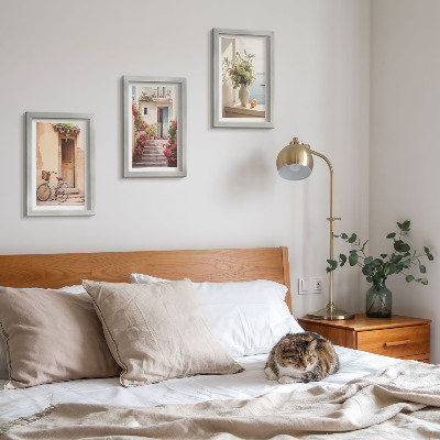 Framed triptych Charming seaside streets with flowers and bicycles