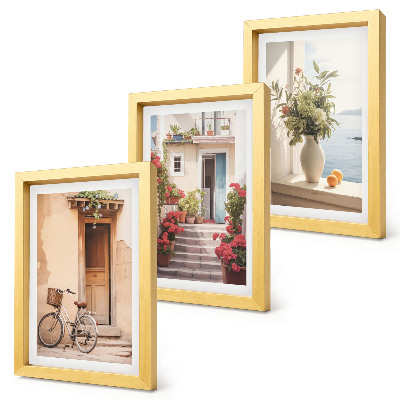Framed triptych Charming seaside streets with flowers and bicycles