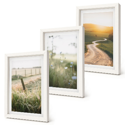 Photo frame wall Landscape with a meadow, road and sunset