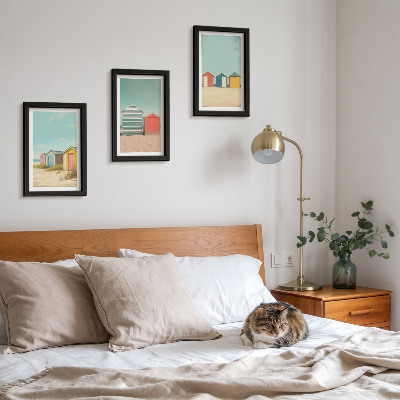 Framed triptych Colorful beach houses in the summer sun
