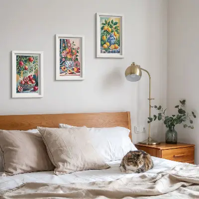 Painted flowers and fruit in vases framed triptych