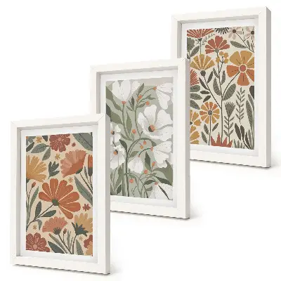 Framed triptych with floral patterns in shades of orange and green