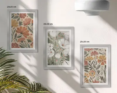 Framed triptych with floral patterns in shades of orange and green