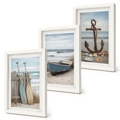 Photo frame wall a beach scene with a rowboat and an anchor in the sand