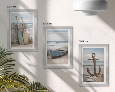 Photo frame wall A beach with a rowboat and an anchor in the sand