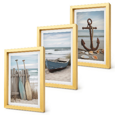 Photo frame wall A beach with a rowboat and an anchor in the sand